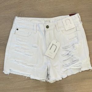 White jean shorts still with tags